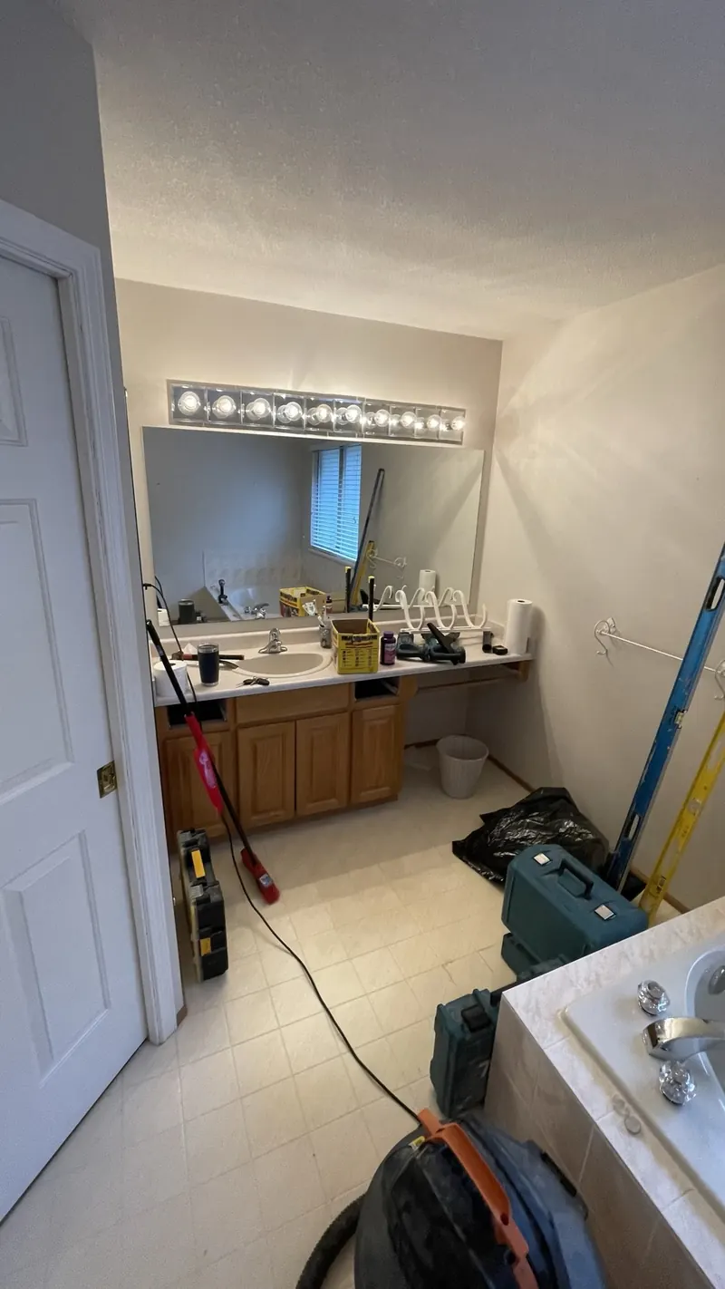 The original vanity sink and hutch before removal